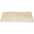Light beige travertine stone niche shelf with matte finish and beveled edges for shower storage