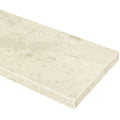 Madreperola Creamy Beige quartz knee wall cap with polished finish and subtle fossil patterns