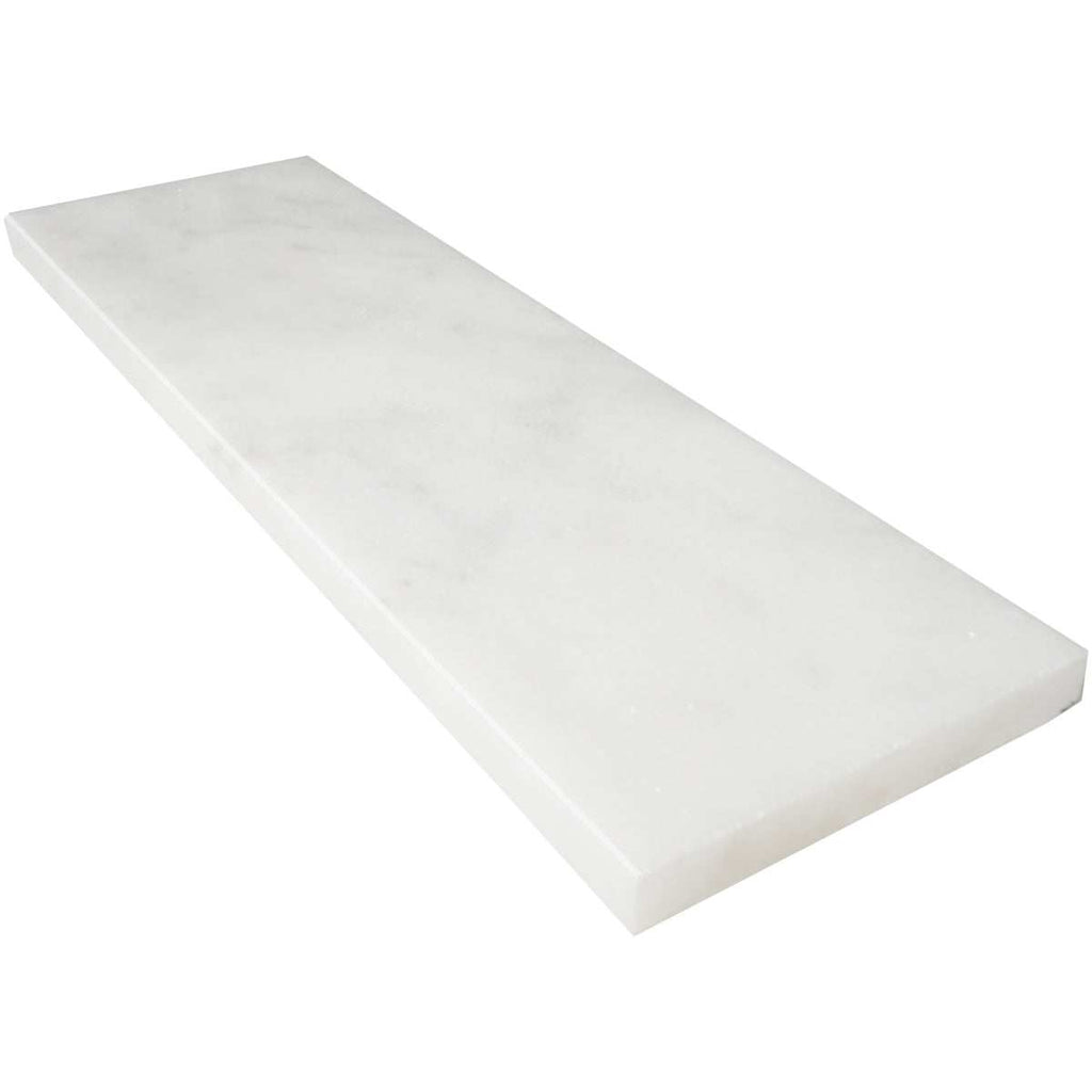 White Carrara marble window sill with polished finish and subtle eased bevel