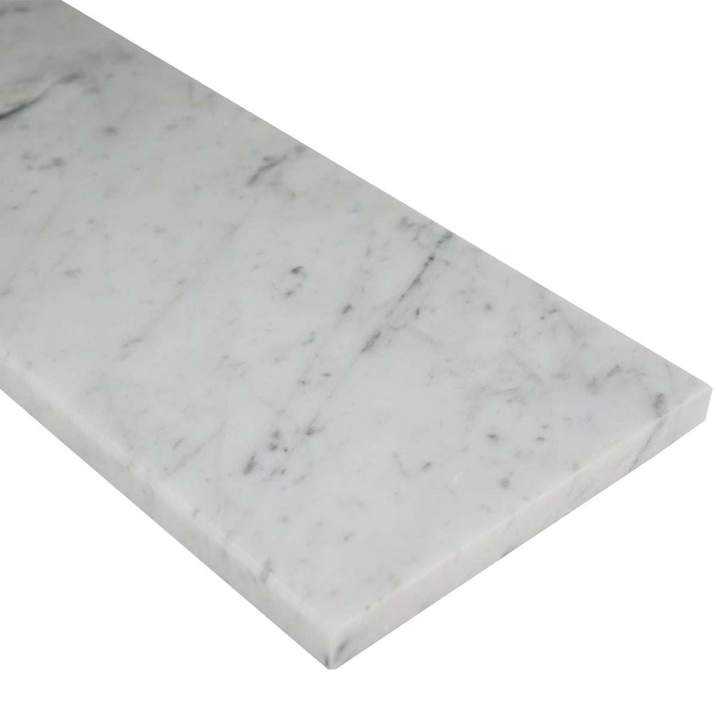 Carrara white marble saddle threshold with polished finish and beveled edges