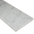Carrara white marble saddle threshold with polished finish and beveled edges