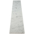 Carrara white marble shower curb with polished finish and beveled edges