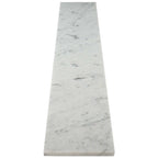 Carrara white marble shower curb with polished finish and beveled edges