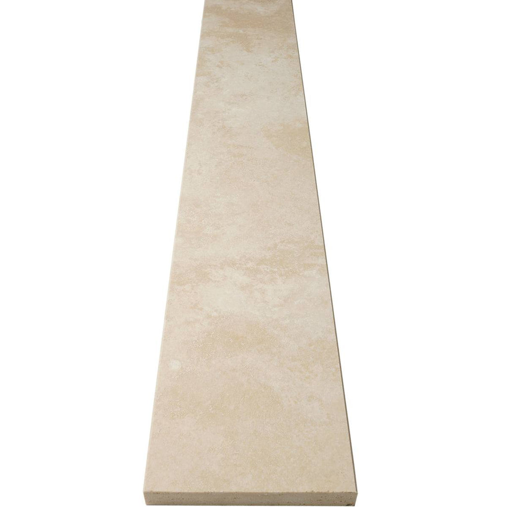 Ivory light travertine saddle threshold with honed beige finish and beveled edges