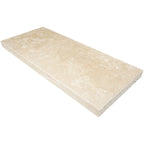 Light beige travertine stone niche shelf with matte finish and beveled edges for shower storage
